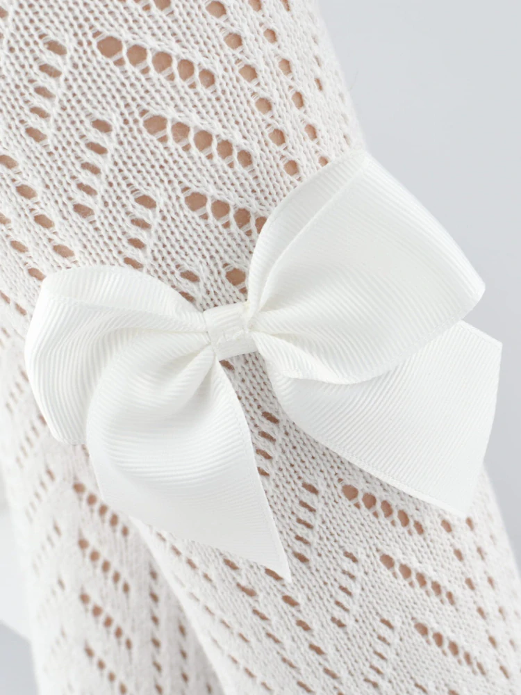 Dievčenské ažurové pančuchové nohavice s mašličkou